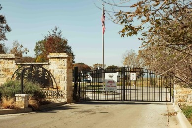 Discover the perfect balance of privacy and luxury in the on Cedar Creek Country Club in Texas - for sale on GolfHomes.com, golf home, golf lot