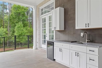 Walk into this stunning contemporary single story home w/no on The Governors Towne Club in Georgia - for sale on GolfHomes.com, golf home, golf lot