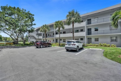 This spacious 2-bedroom, 2-bathroom condo in Tamarac's desirable on Colony West Country Club in Florida - for sale on GolfHomes.com, golf home, golf lot
