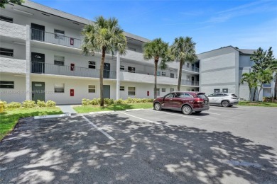 This spacious 2-bedroom, 2-bathroom condo in Tamarac's desirable on Colony West Country Club in Florida - for sale on GolfHomes.com, golf home, golf lot