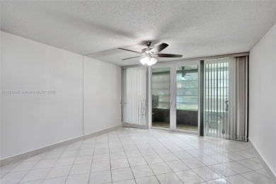 This spacious 2-bedroom, 2-bathroom condo in Tamarac's desirable on Colony West Country Club in Florida - for sale on GolfHomes.com, golf home, golf lot
