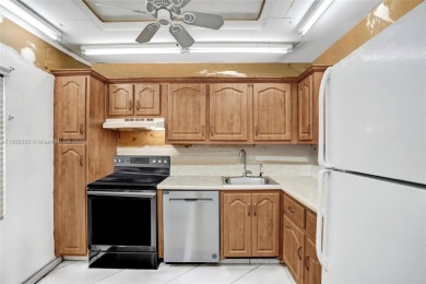 This spacious 2-bedroom, 2-bathroom condo in Tamarac's desirable on Colony West Country Club in Florida - for sale on GolfHomes.com, golf home, golf lot
