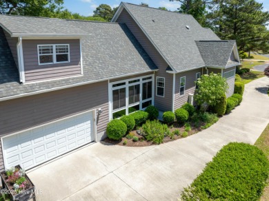 Nestled in a quiet cul-de-sac and backed by a serene pond shaded on Members Club At St. James Plantation in North Carolina - for sale on GolfHomes.com, golf home, golf lot