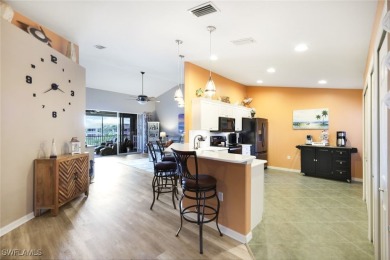 Welcome to your dream waterfront carriage home in the on Colonial Country Club in Florida - for sale on GolfHomes.com, golf home, golf lot