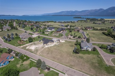 Elevated .463-acre lot in Mission Bay Village Phase 2, located on Polson Bay Golf Course - Championship Course in Montana - for sale on GolfHomes.com, golf home, golf lot