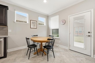 Charming Abbeyville Model located in the vibrant 55+ community on Frisco Lakes Golf Course in Texas - for sale on GolfHomes.com, golf home, golf lot