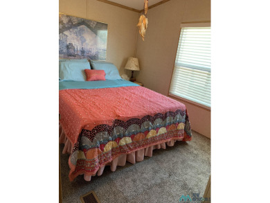 Exceptional 3-Bedroom, 2-Bath Manufactured Home on Prime Corner on Sierra Del Rio Golf Club in New Mexico - for sale on GolfHomes.com, golf home, golf lot