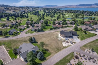 Elevated .463-acre lot in Mission Bay Village Phase 2, located on Polson Bay Golf Course - Championship Course in Montana - for sale on GolfHomes.com, golf home, golf lot