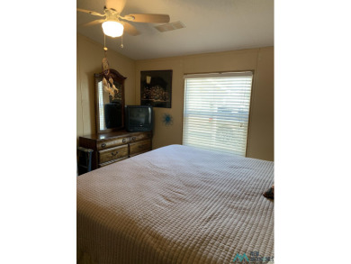 Exceptional 3-Bedroom, 2-Bath Manufactured Home on Prime Corner on Sierra Del Rio Golf Club in New Mexico - for sale on GolfHomes.com, golf home, golf lot