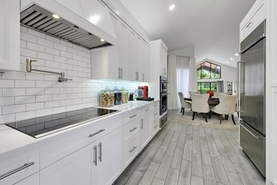 Discover this charming two bedroom, two bathroom upgraded & on Boca Grove Golf and Tennis in Florida - for sale on GolfHomes.com, golf home, golf lot