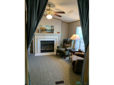 Exceptional 3-Bedroom, 2-Bath Manufactured Home on Prime Corner on Sierra Del Rio Golf Club in New Mexico - for sale on GolfHomes.com, golf home, golf lot