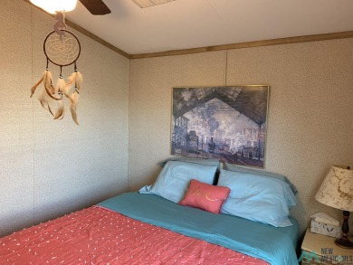 Exceptional 3-Bedroom, 2-Bath Manufactured Home on Prime Corner on Sierra Del Rio Golf Club in New Mexico - for sale on GolfHomes.com, golf home, golf lot