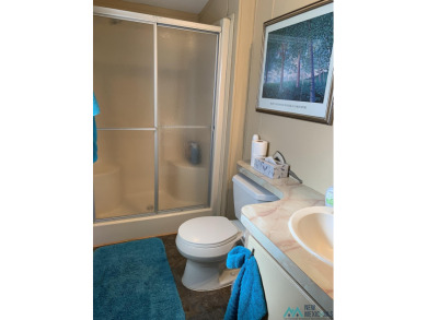 Exceptional 3-Bedroom, 2-Bath Manufactured Home on Prime Corner on Sierra Del Rio Golf Club in New Mexico - for sale on GolfHomes.com, golf home, golf lot