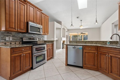 **Oviedo Pool Home on Twin Rivers Golf Course | 4BR/2BA | Split on Twin Rivers Golf Club in Florida - for sale on GolfHomes.com, golf home, golf lot