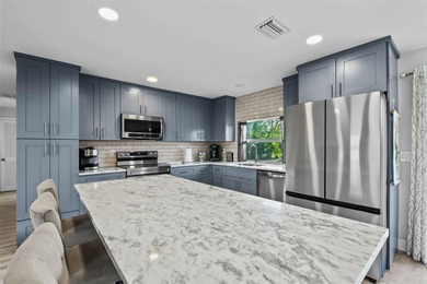 Welcome to 18470 Geranium Rd., where MODERN style meets WARM on Estero Country Club in Florida - for sale on GolfHomes.com, golf home, golf lot