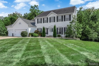 Curb appeal beyond compare! This majestic Winghaven 2-story on Winghaven Country Club in Missouri - for sale on GolfHomes.com, golf home, golf lot