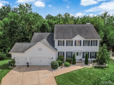 Curb appeal beyond compare! This majestic Winghaven 2-story on Winghaven Country Club in Missouri - for sale on GolfHomes.com, golf home, golf lot