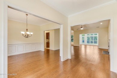 This elegant all-brick, one-level home is perfectly situated in on Reserve Club At St James Plantation in North Carolina - for sale on GolfHomes.com, golf home, golf lot