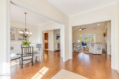 This elegant all-brick, one-level home is perfectly situated in on Reserve Club At St James Plantation in North Carolina - for sale on GolfHomes.com, golf home, golf lot