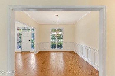 This elegant all-brick, one-level home is perfectly situated in on Reserve Club At St James Plantation in North Carolina - for sale on GolfHomes.com, golf home, golf lot
