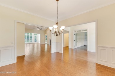 This elegant all-brick, one-level home is perfectly situated in on Reserve Club At St James Plantation in North Carolina - for sale on GolfHomes.com, golf home, golf lot