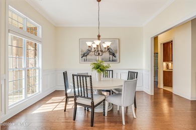 This elegant all-brick, one-level home is perfectly situated in on Reserve Club At St James Plantation in North Carolina - for sale on GolfHomes.com, golf home, golf lot