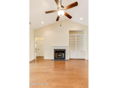 This elegant all-brick, one-level home is perfectly situated in on Reserve Club At St James Plantation in North Carolina - for sale on GolfHomes.com, golf home, golf lot