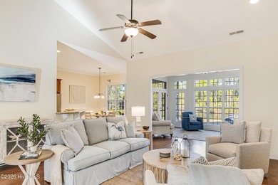 This elegant all-brick, one-level home is perfectly situated in on Reserve Club At St James Plantation in North Carolina - for sale on GolfHomes.com, golf home, golf lot