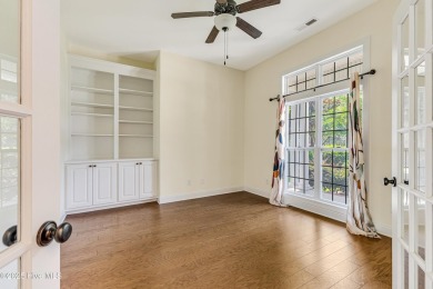 This elegant all-brick, one-level home is perfectly situated in on Reserve Club At St James Plantation in North Carolina - for sale on GolfHomes.com, golf home, golf lot