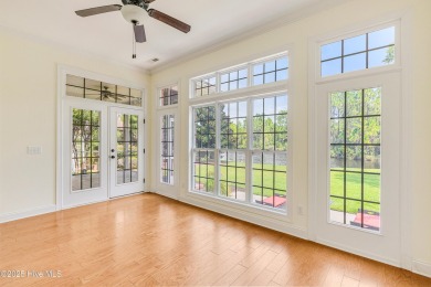 This elegant all-brick, one-level home is perfectly situated in on Reserve Club At St James Plantation in North Carolina - for sale on GolfHomes.com, golf home, golf lot