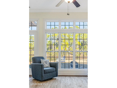 This elegant all-brick, one-level home is perfectly situated in on Reserve Club At St James Plantation in North Carolina - for sale on GolfHomes.com, golf home, golf lot