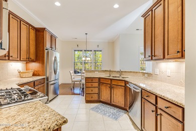 This elegant all-brick, one-level home is perfectly situated in on Reserve Club At St James Plantation in North Carolina - for sale on GolfHomes.com, golf home, golf lot