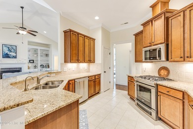 This elegant all-brick, one-level home is perfectly situated in on Reserve Club At St James Plantation in North Carolina - for sale on GolfHomes.com, golf home, golf lot