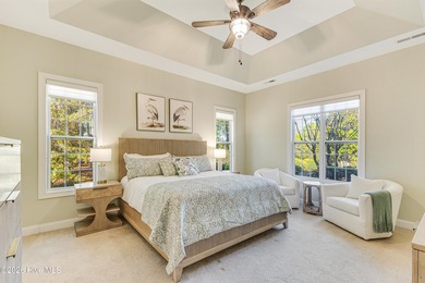 This elegant all-brick, one-level home is perfectly situated in on Reserve Club At St James Plantation in North Carolina - for sale on GolfHomes.com, golf home, golf lot