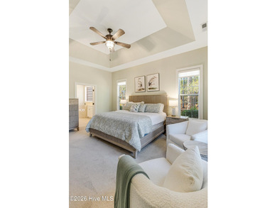 This elegant all-brick, one-level home is perfectly situated in on Reserve Club At St James Plantation in North Carolina - for sale on GolfHomes.com, golf home, golf lot