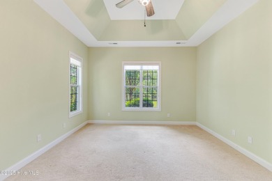 This elegant all-brick, one-level home is perfectly situated in on Reserve Club At St James Plantation in North Carolina - for sale on GolfHomes.com, golf home, golf lot