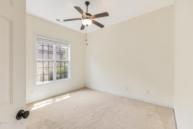 This elegant all-brick, one-level home is perfectly situated in on Reserve Club At St James Plantation in North Carolina - for sale on GolfHomes.com, golf home, golf lot