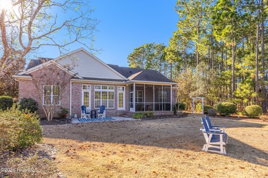 This elegant all-brick, one-level home is perfectly situated in on Reserve Club At St James Plantation in North Carolina - for sale on GolfHomes.com, golf home, golf lot
