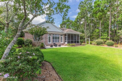 This elegant all-brick, one-level home is perfectly situated in on Reserve Club At St James Plantation in North Carolina - for sale on GolfHomes.com, golf home, golf lot