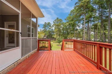 3 car garage, nearly 1 acre lot, screened porch and primary on Bluff Golf Links in North Carolina - for sale on GolfHomes.com, golf home, golf lot