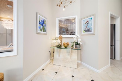 This expansive villa offers the space and comfort of a private on Longboat Key Golf Club Resort in Florida - for sale on GolfHomes.com, golf home, golf lot