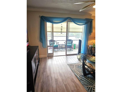 Welcome to luxury 55+ living at Wynmoor Country Club! This on Wynmoor Golf Course in Florida - for sale on GolfHomes.com, golf home, golf lot