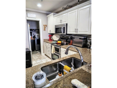One-of-a-Kind Old Kinderhook Condo - Stunning Lake  Golf Course on The Club At Old Kinderhook in Missouri - for sale on GolfHomes.com, golf home, golf lot