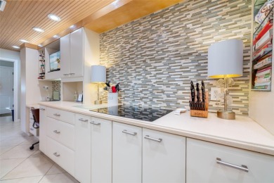 This expansive villa offers the space and comfort of a private on Longboat Key Golf Club Resort in Florida - for sale on GolfHomes.com, golf home, golf lot