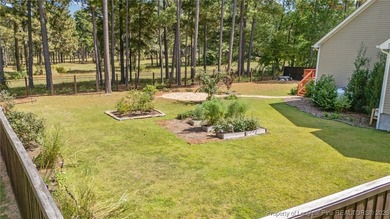 3 car garage, nearly 1 acre lot, screened porch and primary on Bluff Golf Links in North Carolina - for sale on GolfHomes.com, golf home, golf lot