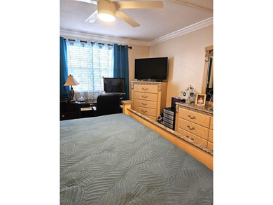 Welcome to luxury 55+ living at Wynmoor Country Club! This on Wynmoor Golf Course in Florida - for sale on GolfHomes.com, golf home, golf lot