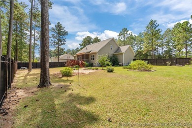 3 car garage, nearly 1 acre lot, screened porch and primary on Bluff Golf Links in North Carolina - for sale on GolfHomes.com, golf home, golf lot