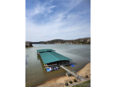 One-of-a-Kind Old Kinderhook Condo - Stunning Lake  Golf Course on The Club At Old Kinderhook in Missouri - for sale on GolfHomes.com, golf home, golf lot