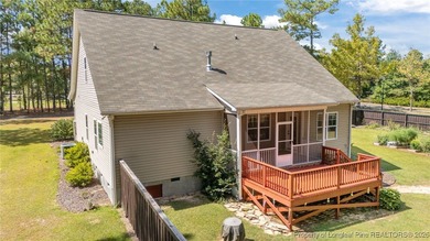 3 car garage, nearly 1 acre lot, screened porch and primary on Bluff Golf Links in North Carolina - for sale on GolfHomes.com, golf home, golf lot