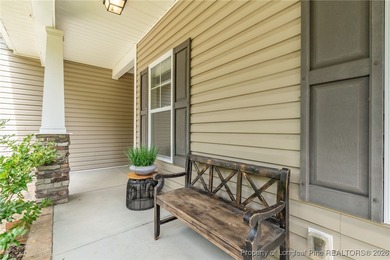 3 car garage, nearly 1 acre lot, screened porch and primary on Bluff Golf Links in North Carolina - for sale on GolfHomes.com, golf home, golf lot